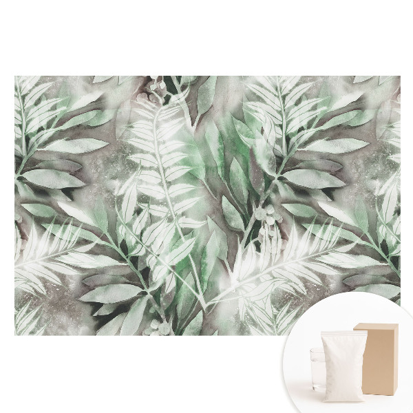 Netkaná tapeta Jemné akvarelové listy v zelené barvě.