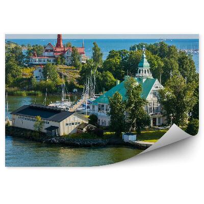 Samolepící fototapeta Skály zelené Faerské ostrovy oceán obloha mraky