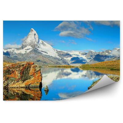 Fototapeta Hory skály sníh oceán nebe mraky