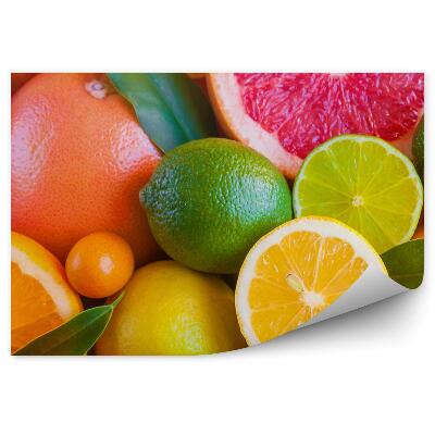 Fototapeta na zeď Čerstvé citrusové plody nakrájené půlky listů