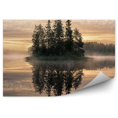 Fototapeta Krajina s mlhou na ostrově při západu slunce