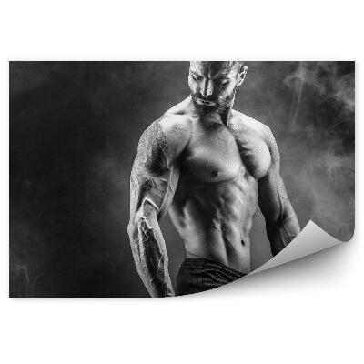 Fototapeta na zeď Svalnatý muž bez trička činky