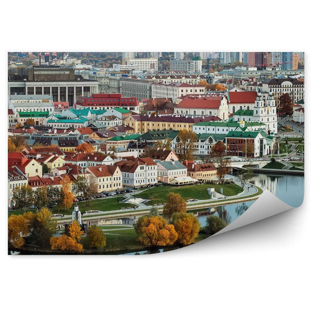 Samolepící fototapeta Panorama města Minsk budovy stromy mosty auta západ slunce