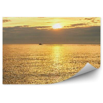 Fototapeta Baltské moře vodní mraky na oranžové obloze