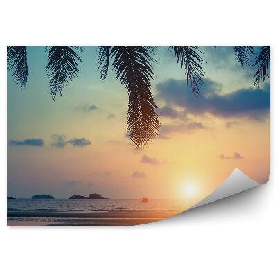 Fototapeta Tropická pláž moře palmy západ slunce