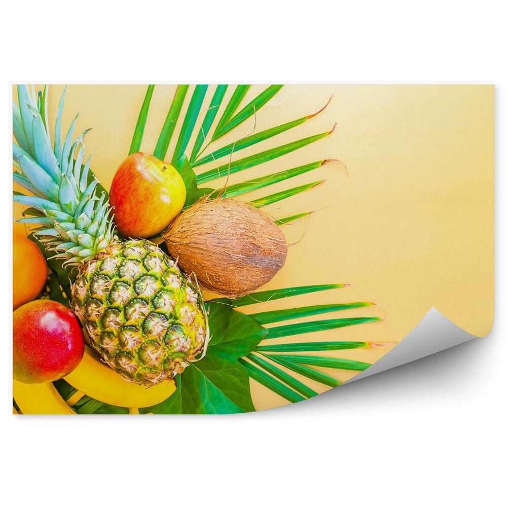 Samolepící fototapeta Tropické ovoce kokos ananas listy žluté pozadí