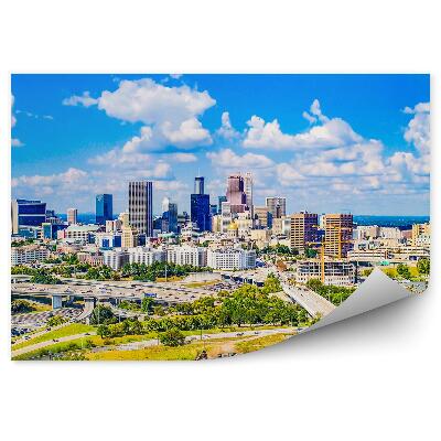 Fototapeta Panorama města mrakodrapy silnice auta tráva stromy nebe mraky Atlanta Georgia