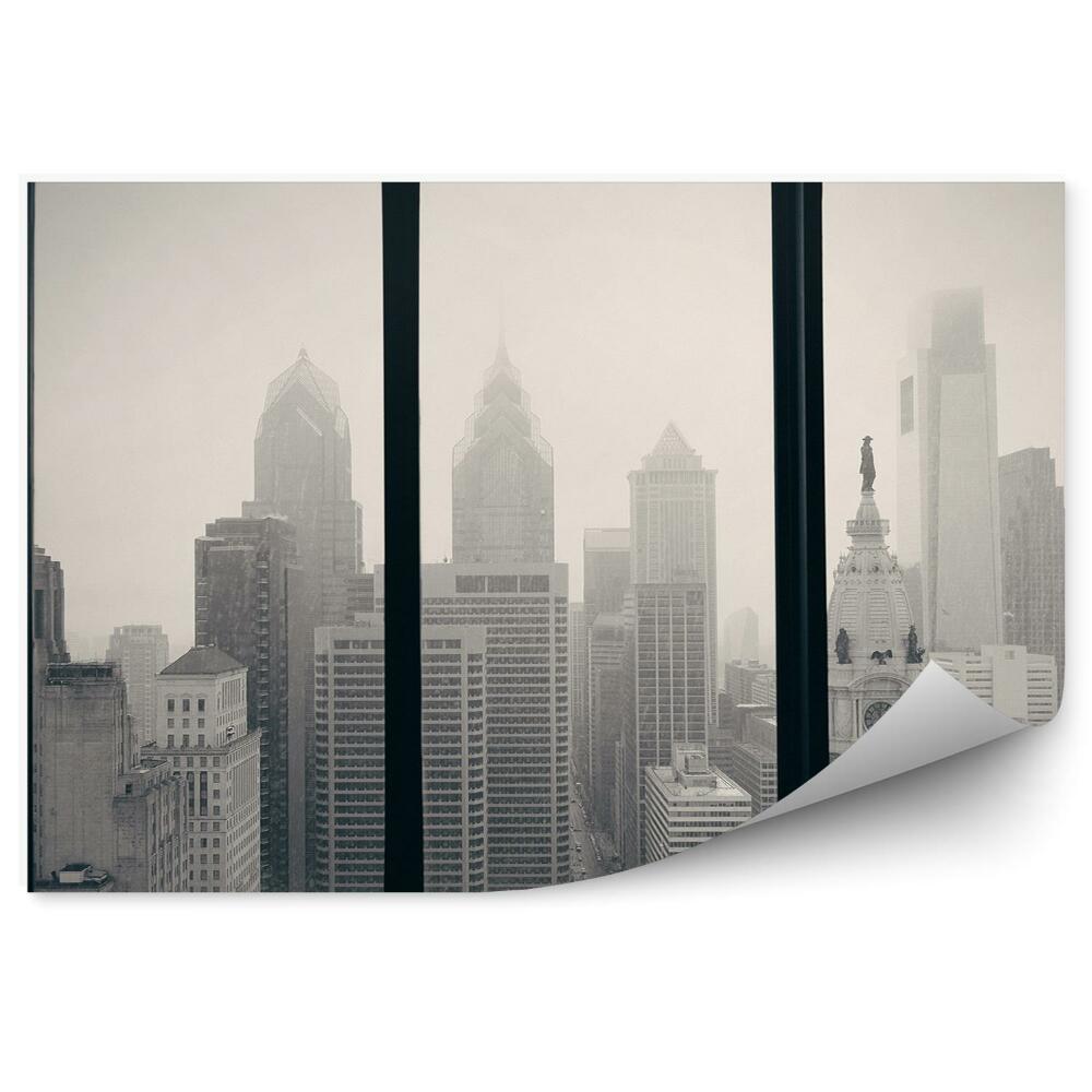 Fototapeta na zeď Černobílá fotografie města za oknem