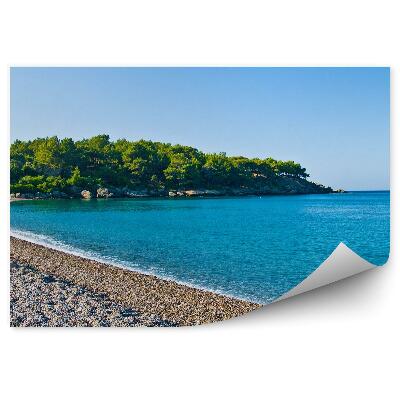 Samolepící fototapeta Modrá laguna vegetace oblázková pláž
