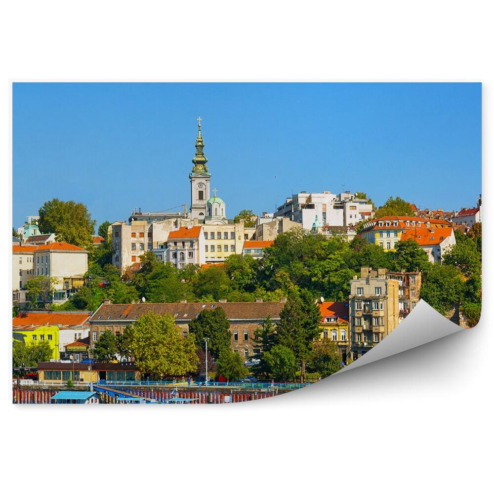 Samolepící fototapeta Bělehrad řeka Sáva město panorama budovy jachty řeka nebe kostel