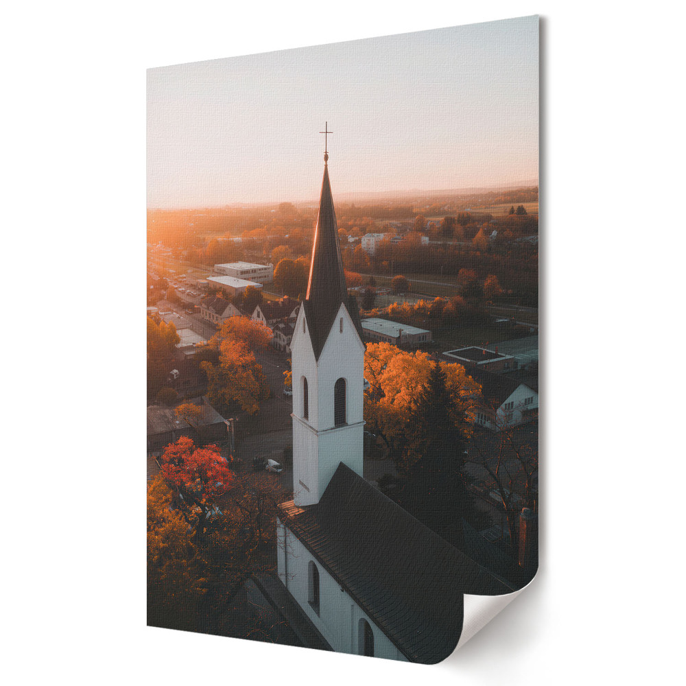 Nástěnná grafika na plátně Zlaté světlo nad kostelem