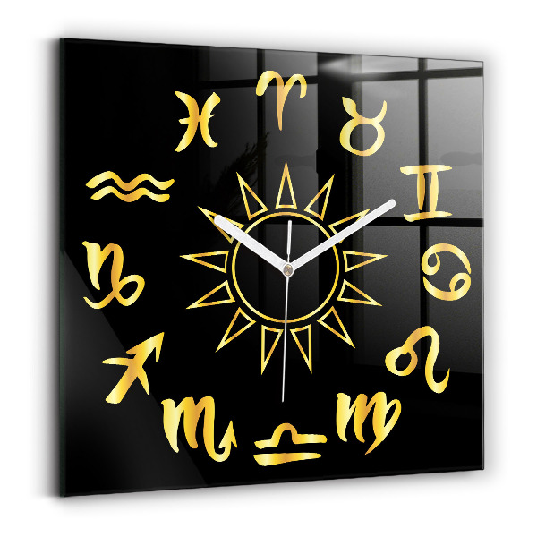 Skleněné hodiny na zed Zlatá astrologická znamení na černém pozadí.